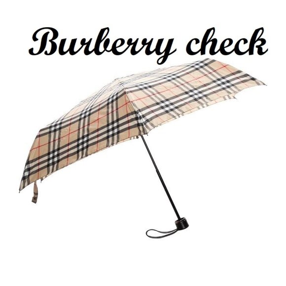Burberry, and Moschino Umbrellas - Picture 1 of 16